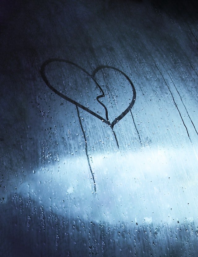 Drawing of heartbreak on window