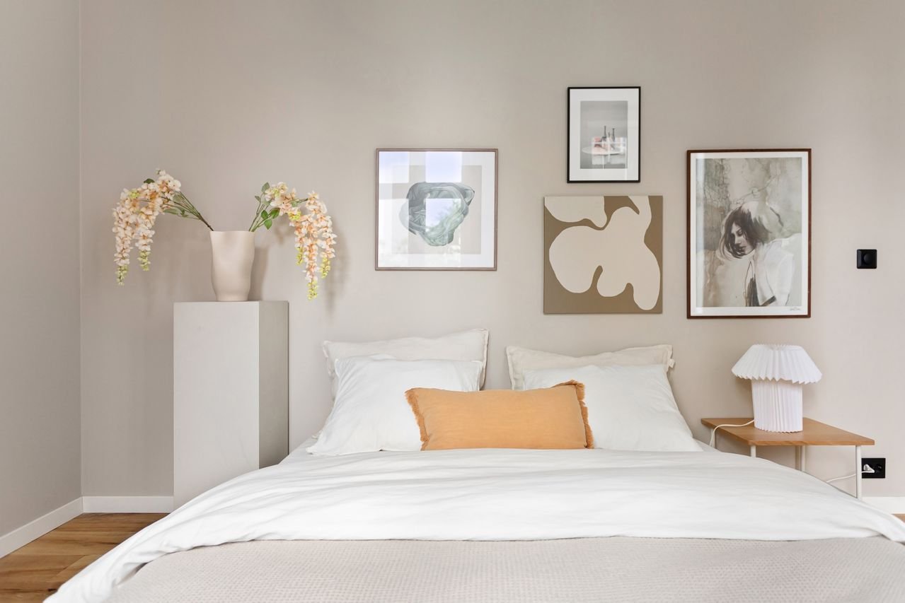 bedroom with wall art decoration